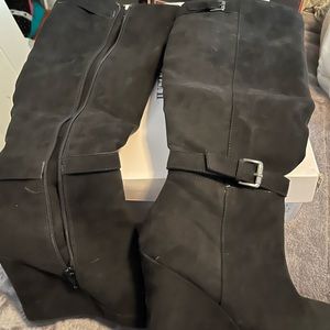 Over the calf wedge heeled boots